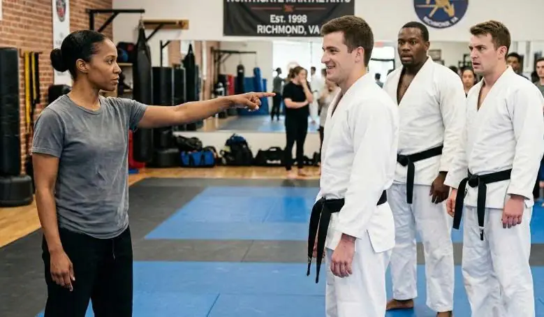 Three Black Belts Told the Quiet Woman to Choose Her Opponent — She Pointed at All of Them