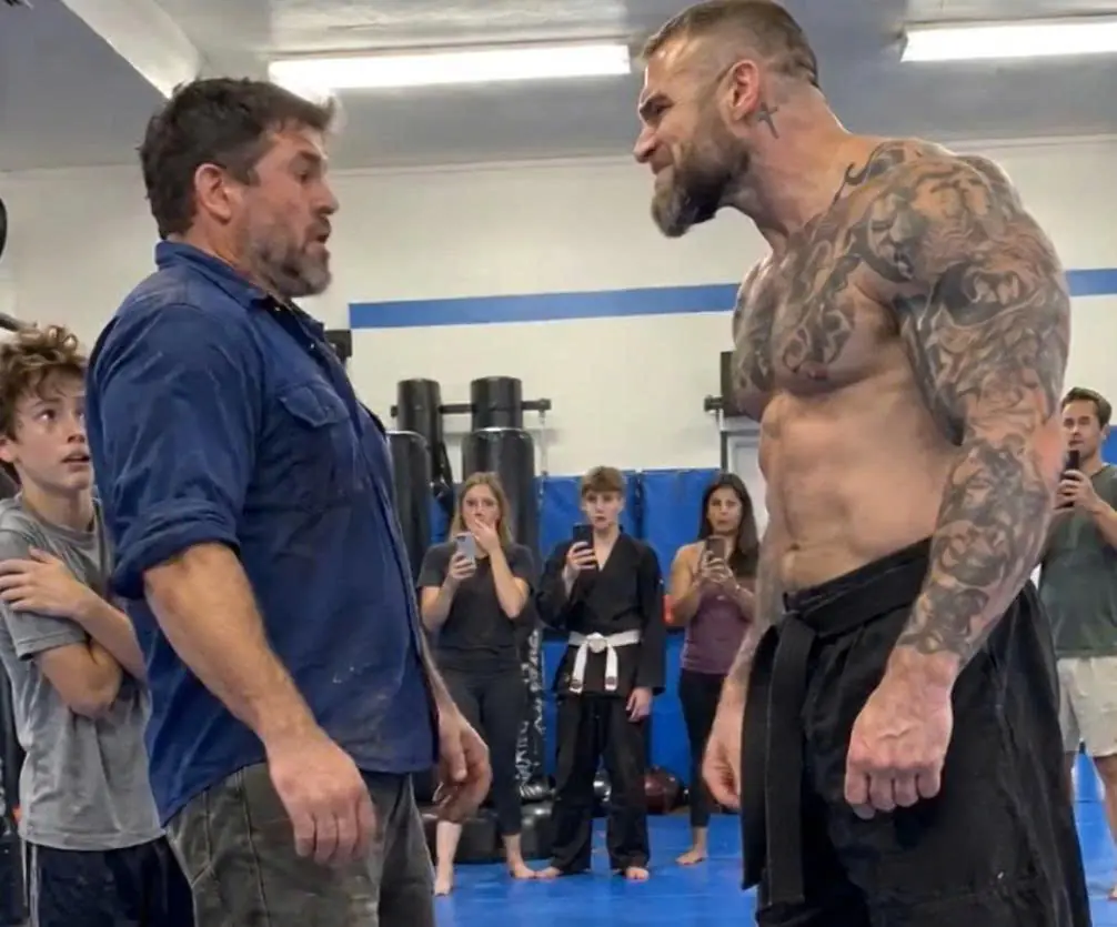 "Sign The Waiver, Delivery Boy," The Arrogant Black Belt Laughed On Camera — The Quiet Single Dad Mechanically Dropped His Work Boots And Unbuttoned His Shirt