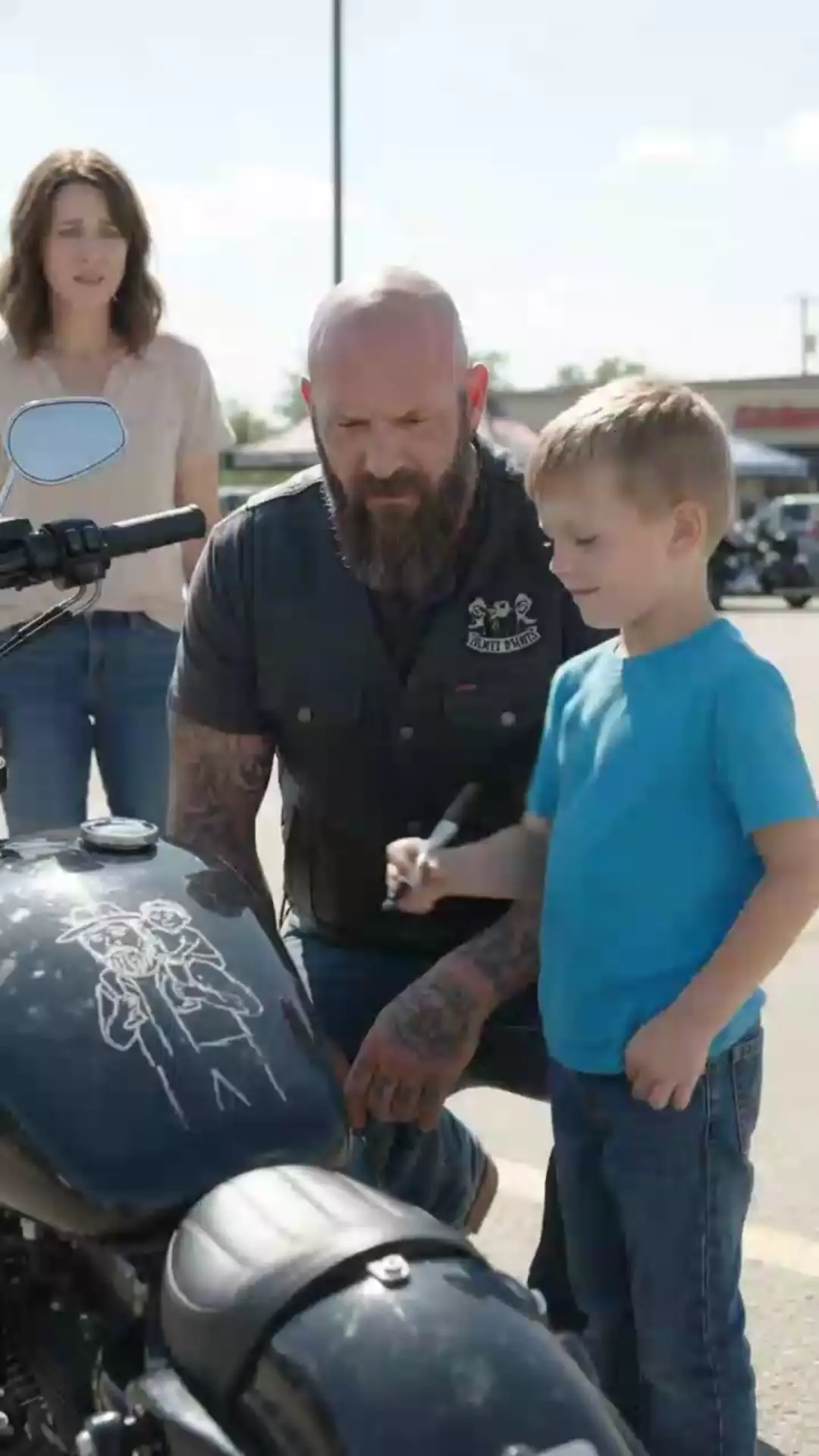 THE BOY WHO DREW ON THE BIKER’S HARLEY